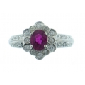 18Kt White Gold Oval Shape Ruby with Diamond Flower Ring (1.23cts tw)